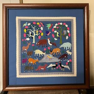 Textile art story cloth depicting animals and trees, Hmong embroidery